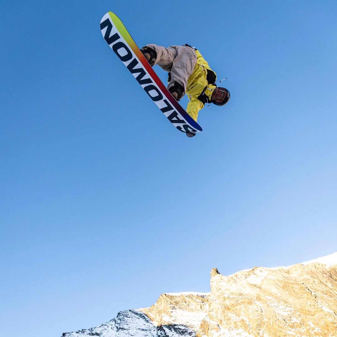 Hanah Hero Lucas Foster snowboarding over a mountain