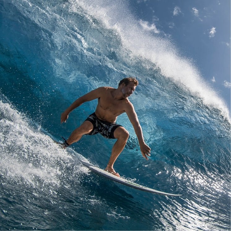 HANAH Hero Travis Rice surfing a large wave. Photo by Ben Thouard