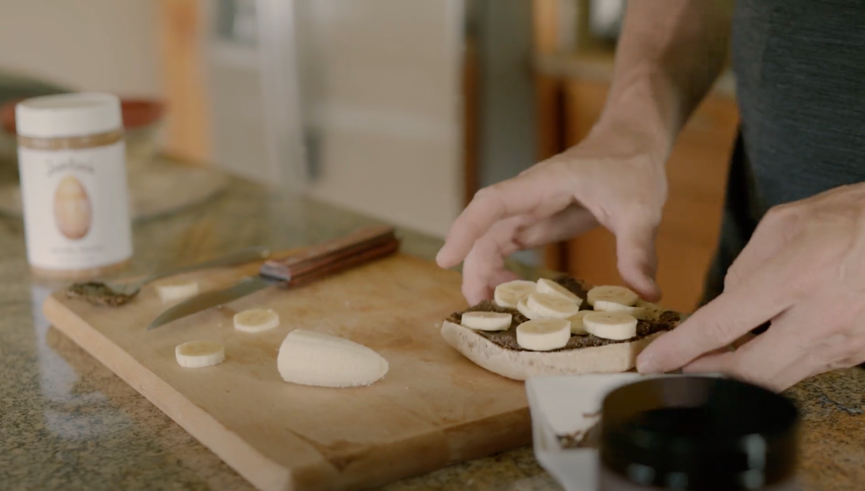 Founder Joel Einhorn's  preparation of a healthy HANAH ONE and almond butter infused toast with banana slices